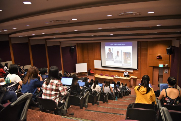 Public speaker Shawn Seah delivers a guest lecture on family history at the National University of Singapore. 