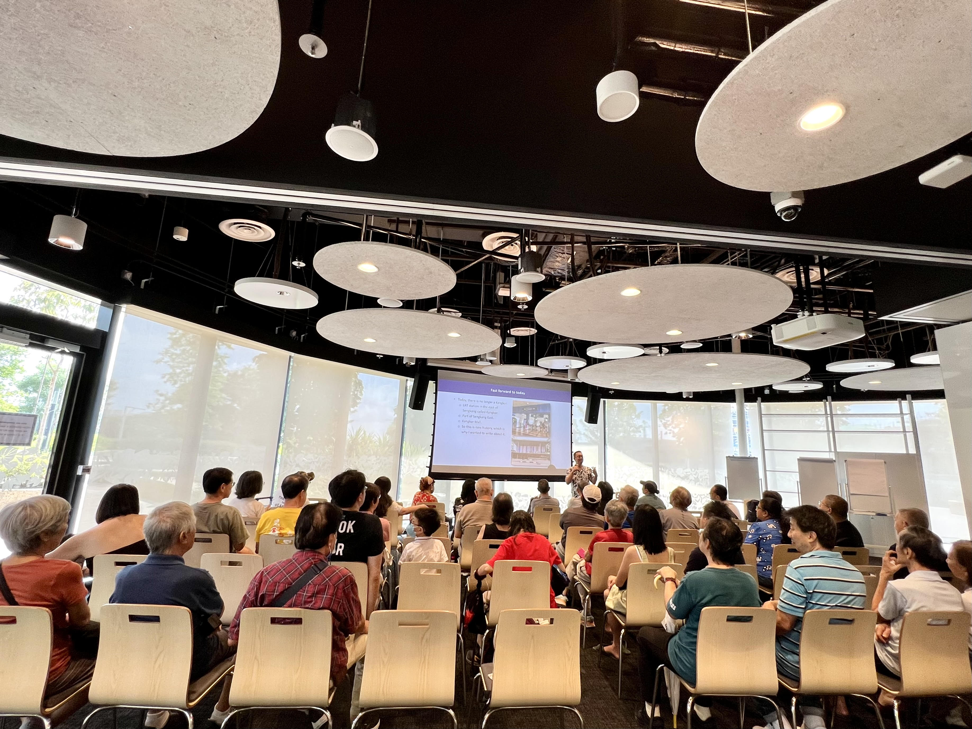 Shawn Seah giving a talk at the Programme Room of the Punggol Regional Library. 