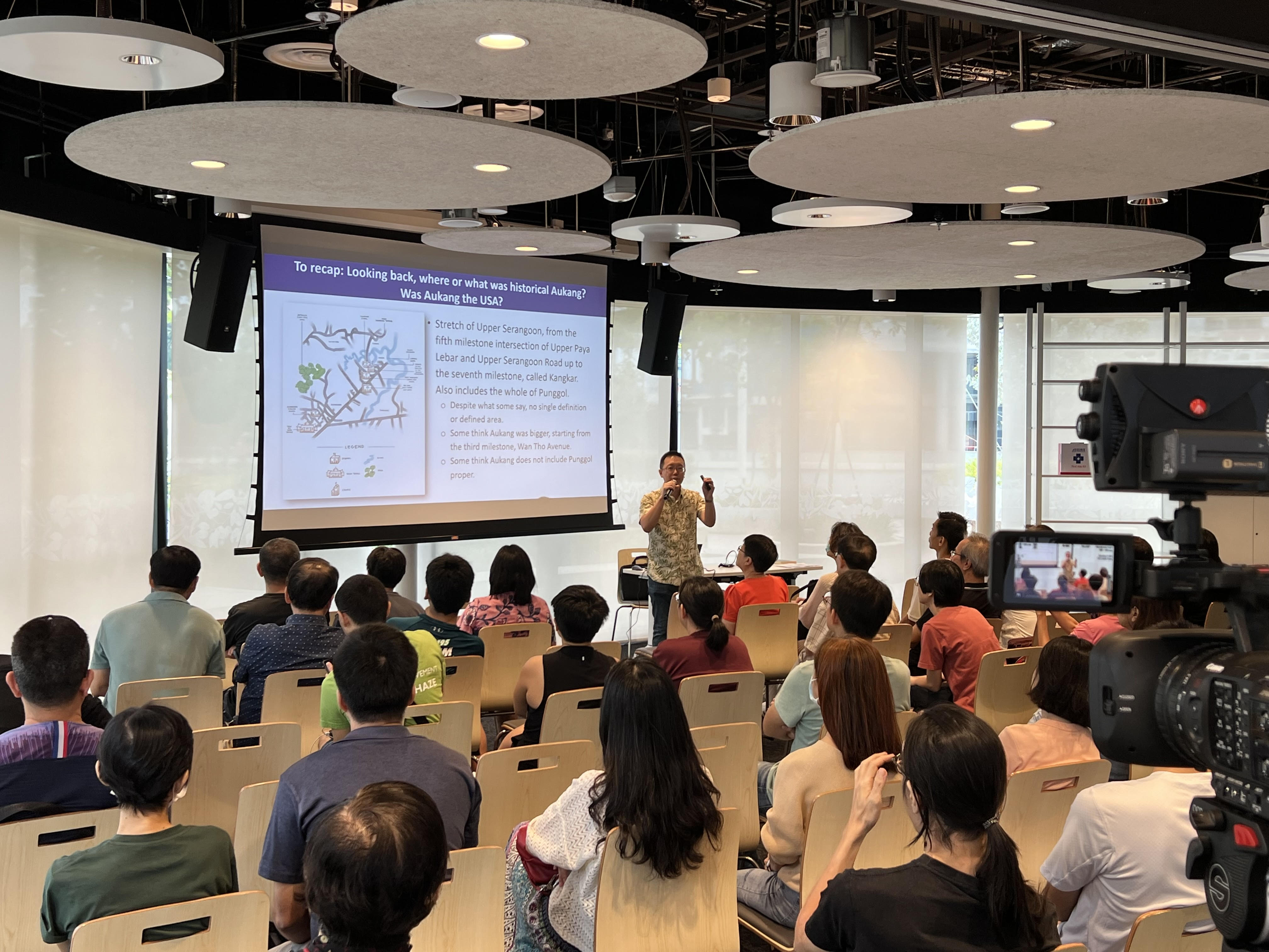 Author and speaker Shawn Seah giving a talk at the Programme Room of the Punggol Regional Library. 