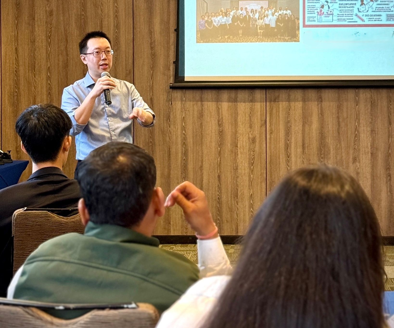 Author and speaker Shawn Seah speaking at a workshop.