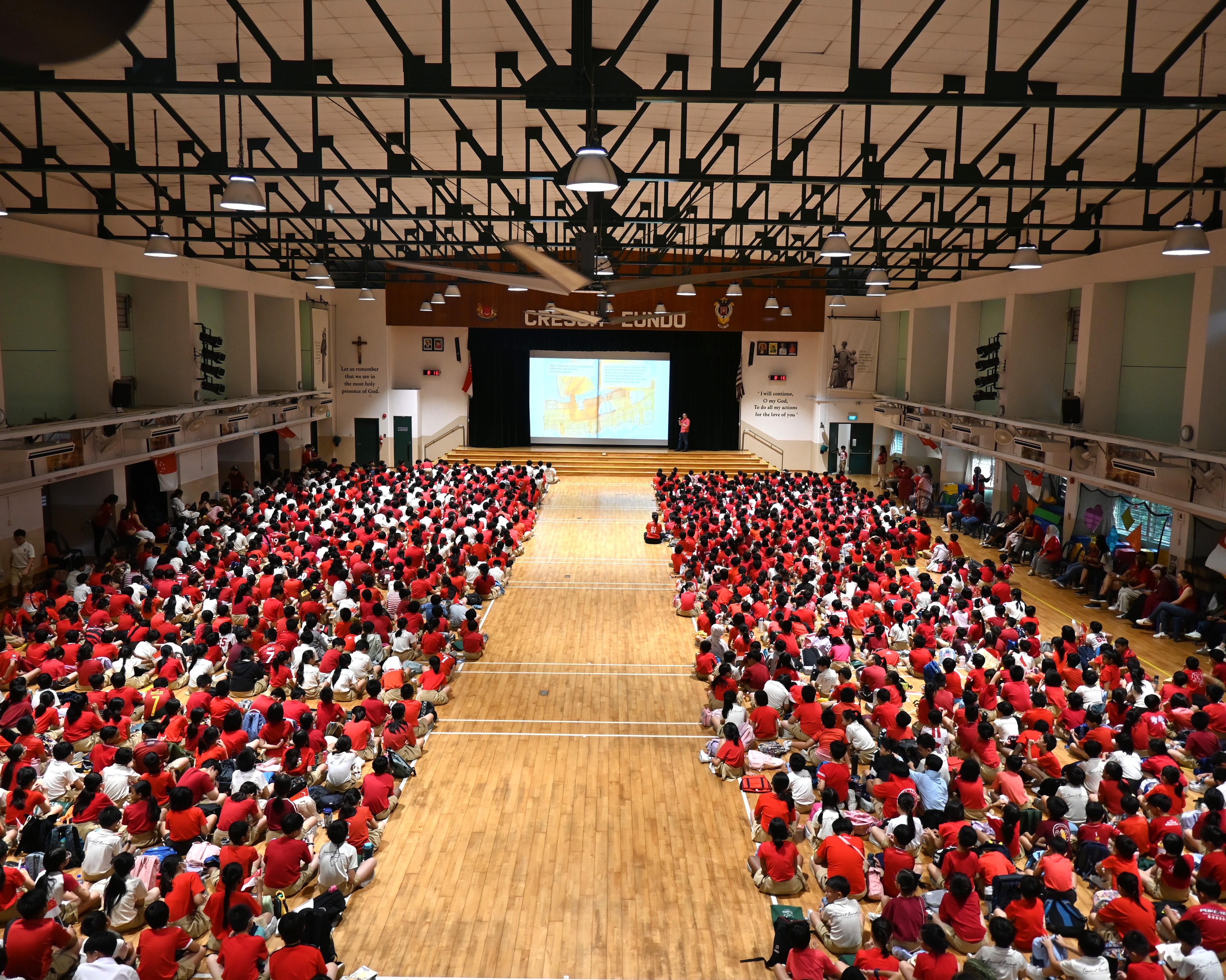Author and speaker Shawn Seah speaking at St Anthony's Primary School during their National Day celebrations.